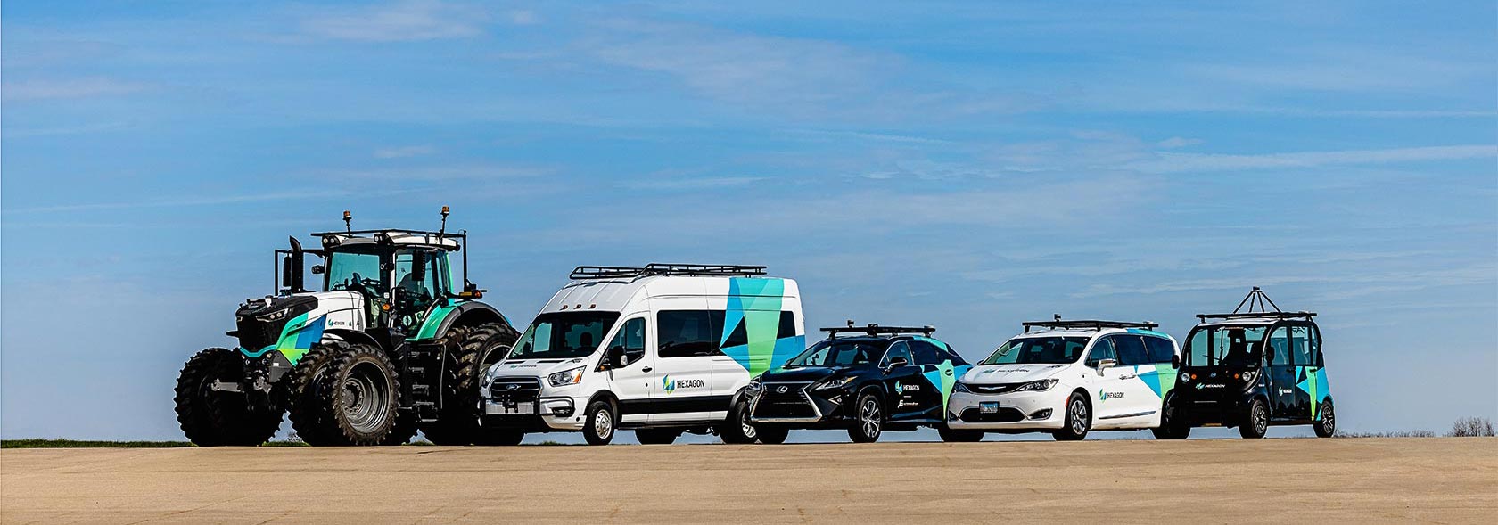 A tractor, Ford Transit, Lexus, Chrysler Pacifica and Polaris GEM